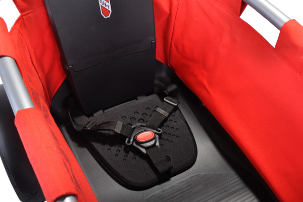 Met ingebouwd kinderzitje en driepuntsgordel.